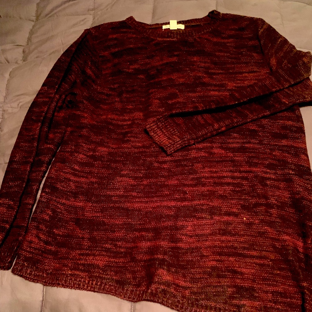 Asymmetrical sweater with side zipper